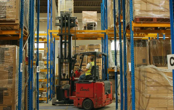 Magnum logistics warehouse forklift driver